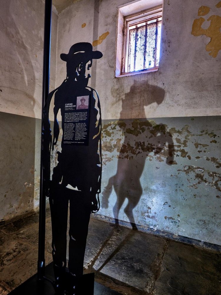 Steel figure silhouette and shadow at The Old Fort, Johannesburg