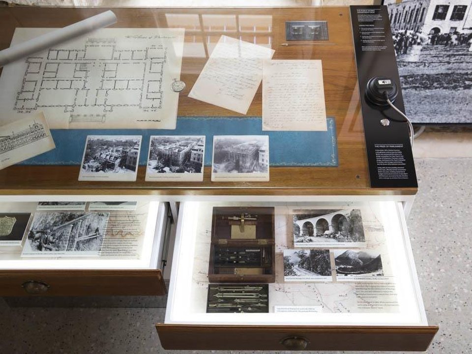Archive table with drawings and photographs