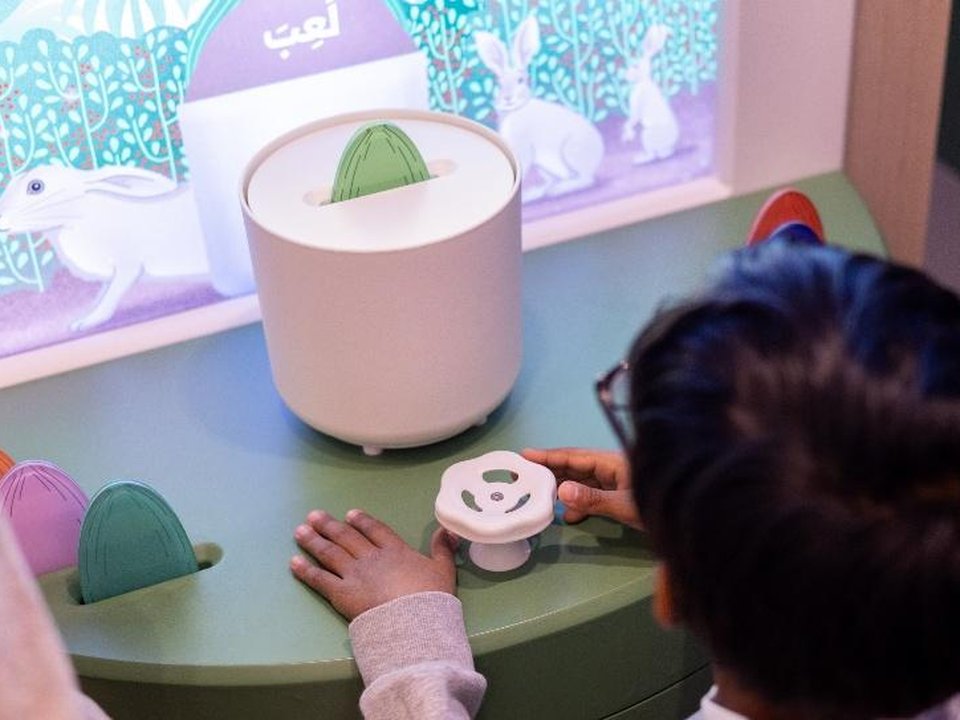 Children engaging with Word Garden interactive exhibit, Saudi Arabia